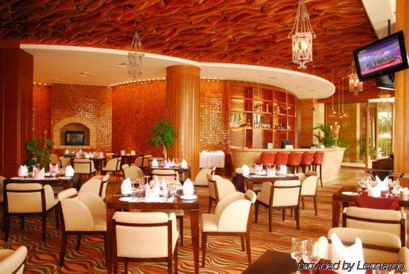 Grand Soluxe Hotel & Resort, Sanya Restaurang bild